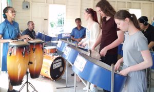 Leeds City College students playing steel pan drums in Antigua