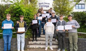 South Devon College students show off their participation certificates after their Brittany placement.